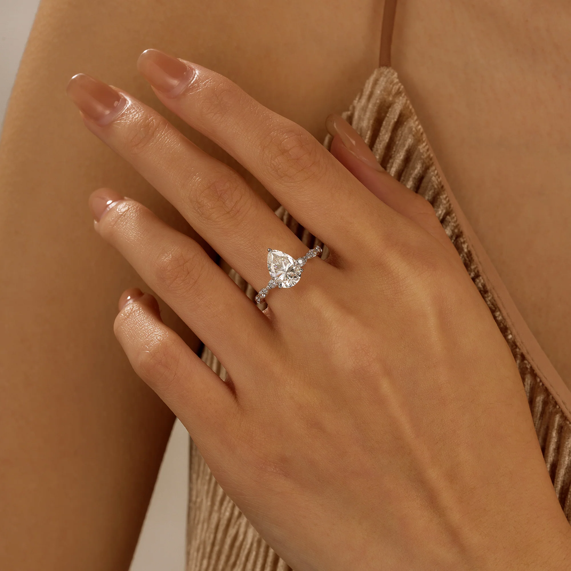 Elegant Pear Shape Moissanite Engagement Ring - Image 12