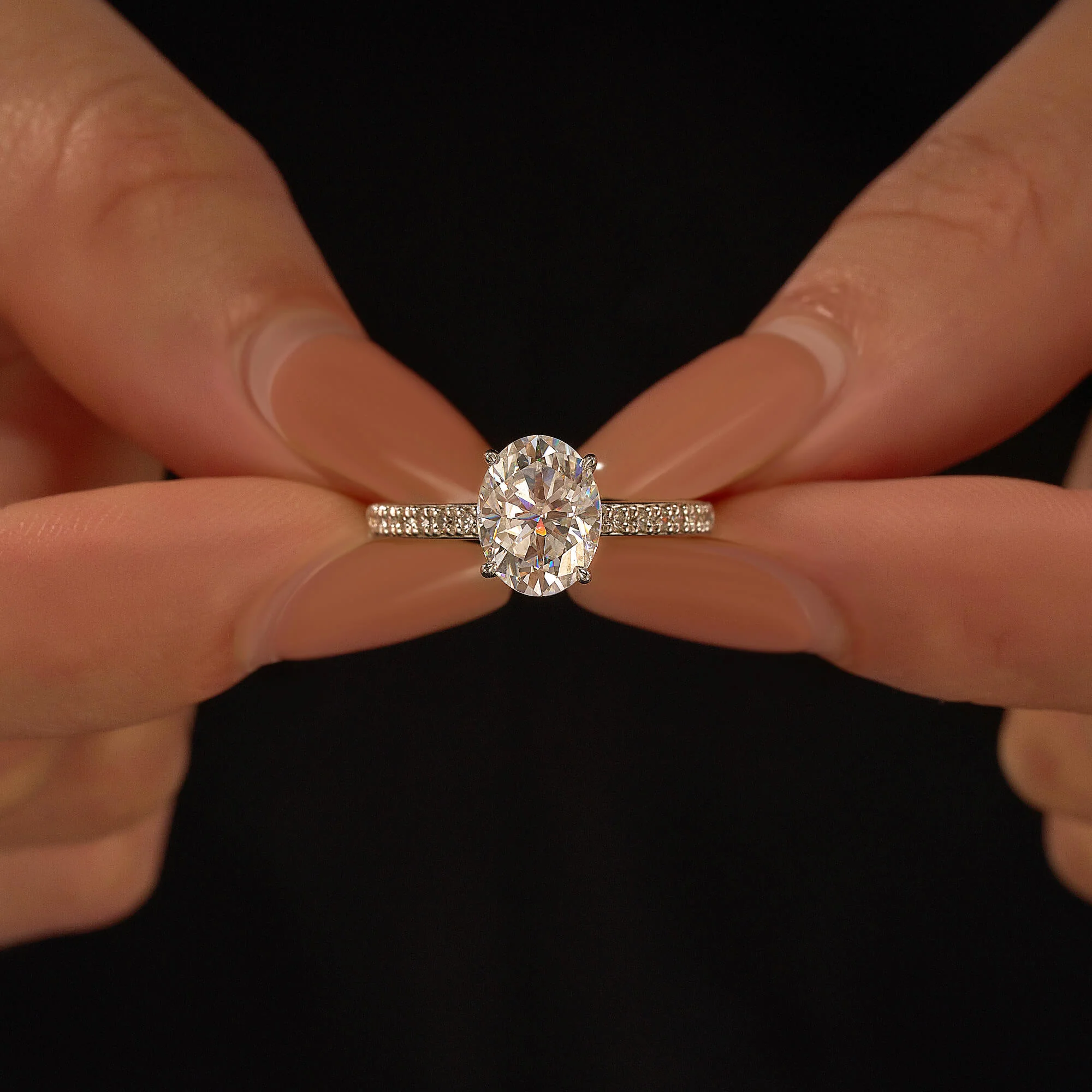 Oval Moissanite Hidden Halo Engagement Ring with Pavé Band - Image 13