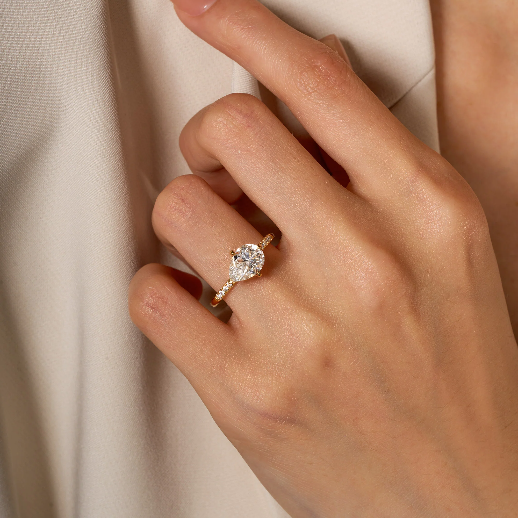 Pear Moissanite East West Ring with Pave Band - Image 11