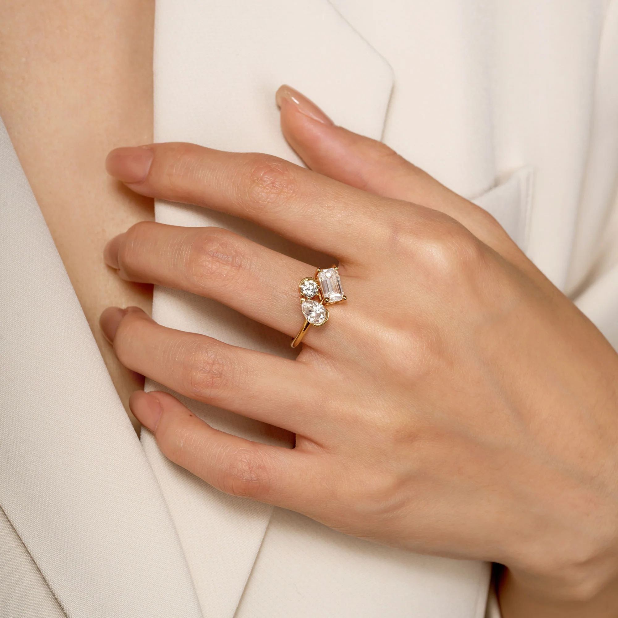 Pear Round Emerald Moissanite Three-Stone Ring - Image 11