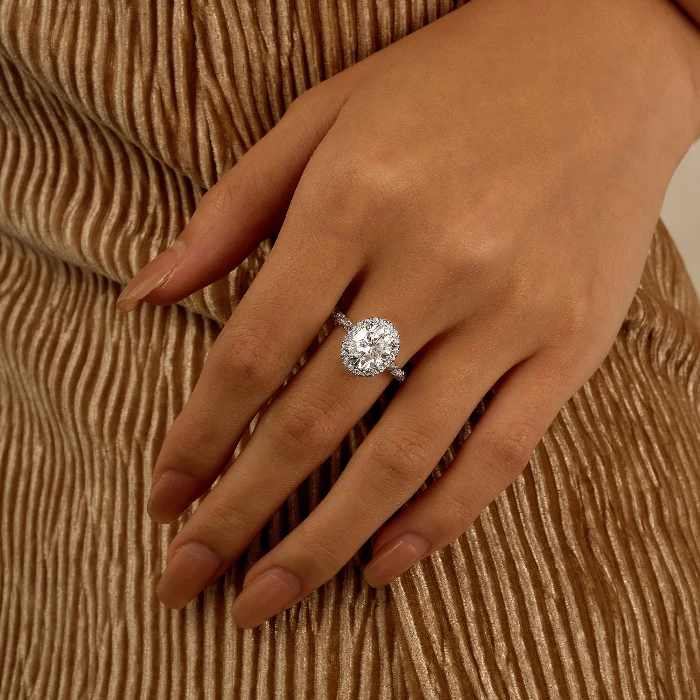 Oval Halo Moissanite Engagement Ring with Twisted Pavé Band - Image 11