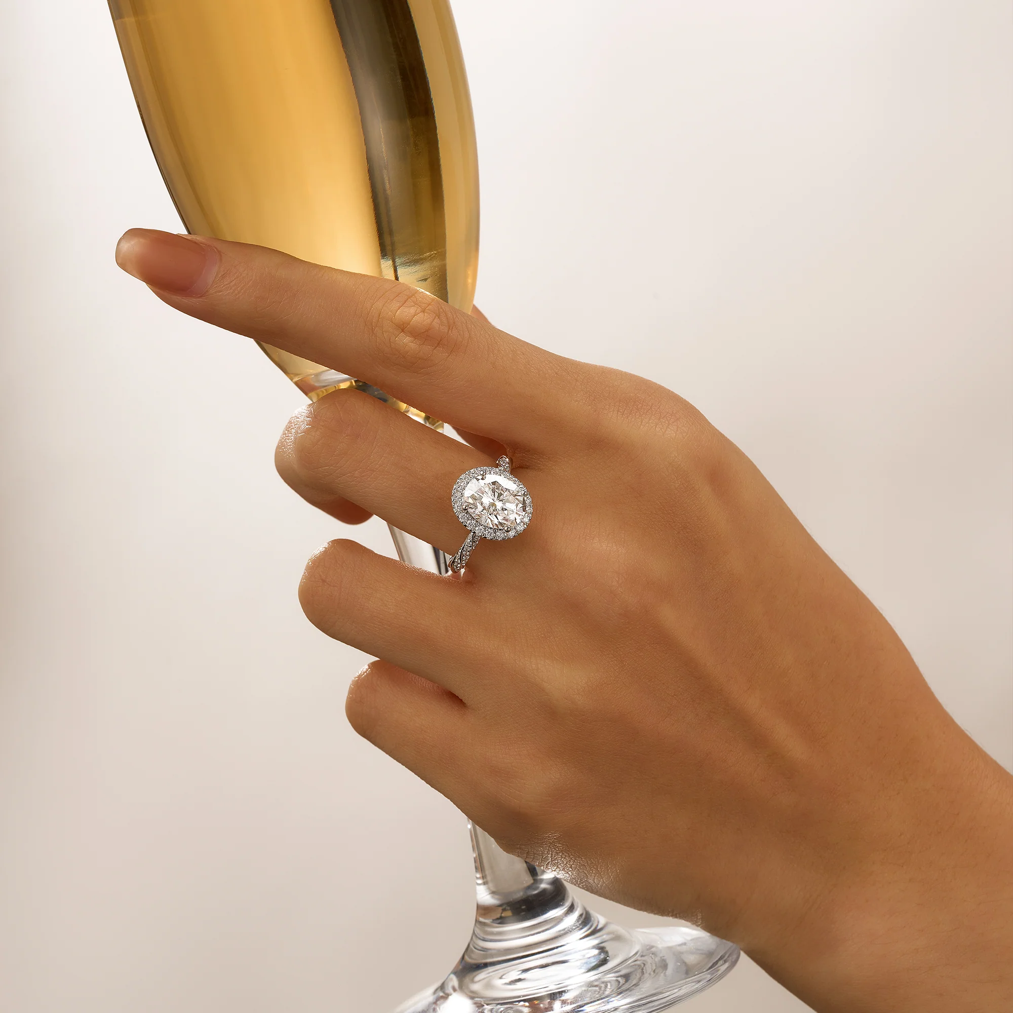 Oval Halo Moissanite Engagement Ring with Twisted Pavé Band - Image 13